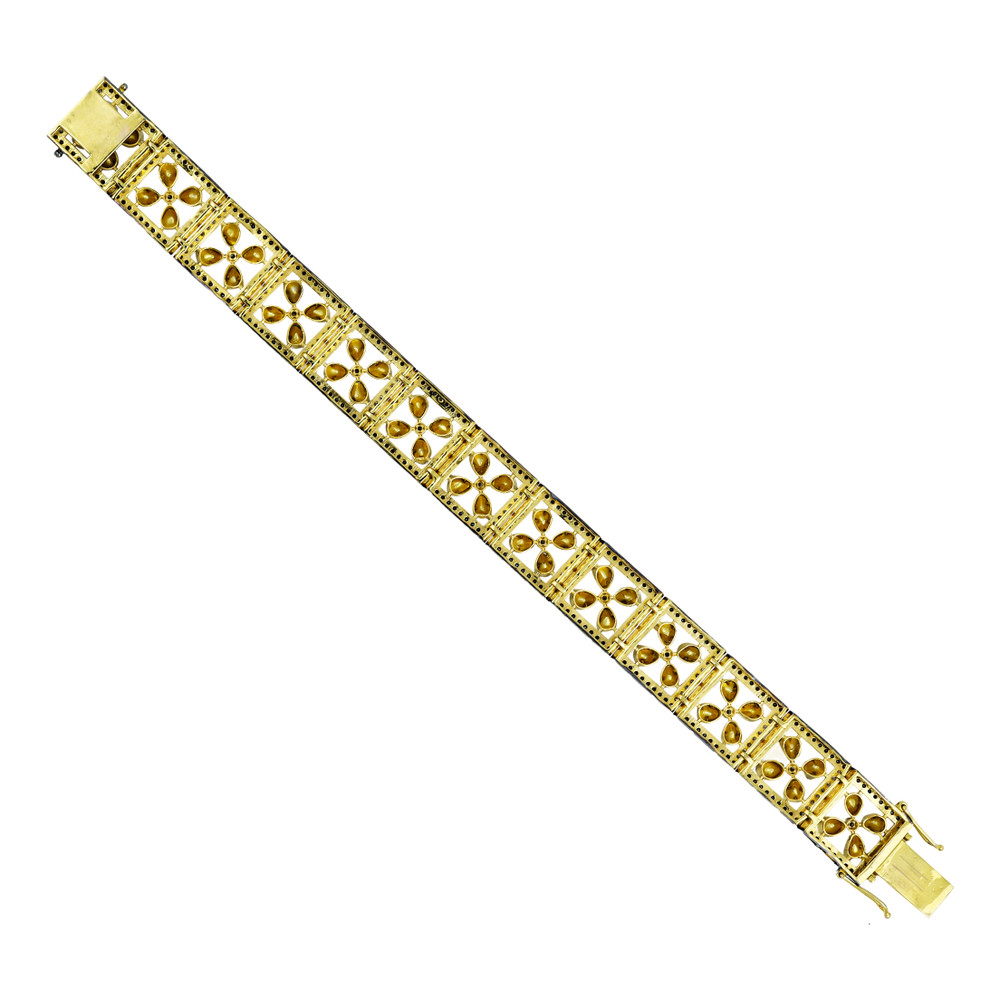 Tennis Bracelet with Floral Polkis and Black Diamond Border