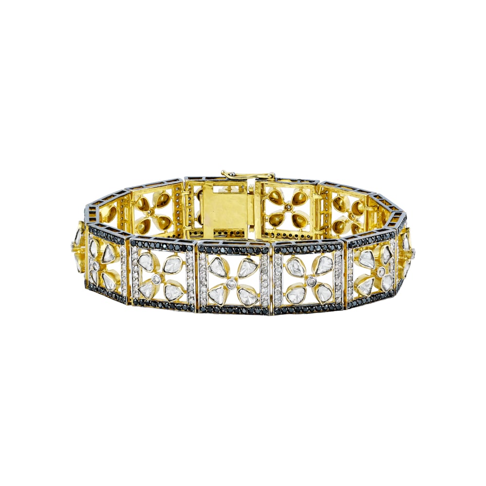 Tennis Bracelet with Floral Polkis and Black Diamond Border