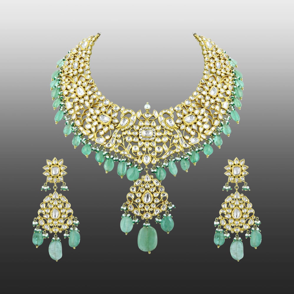 Polki Necklace Set with Gold Detailing and Emerald Drops