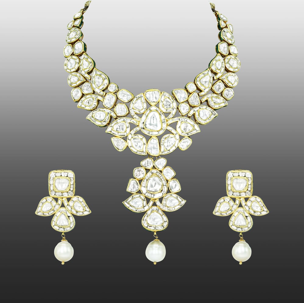 Asymmetrical Polki Necklace Set with Green Enamel and Pearl Drop