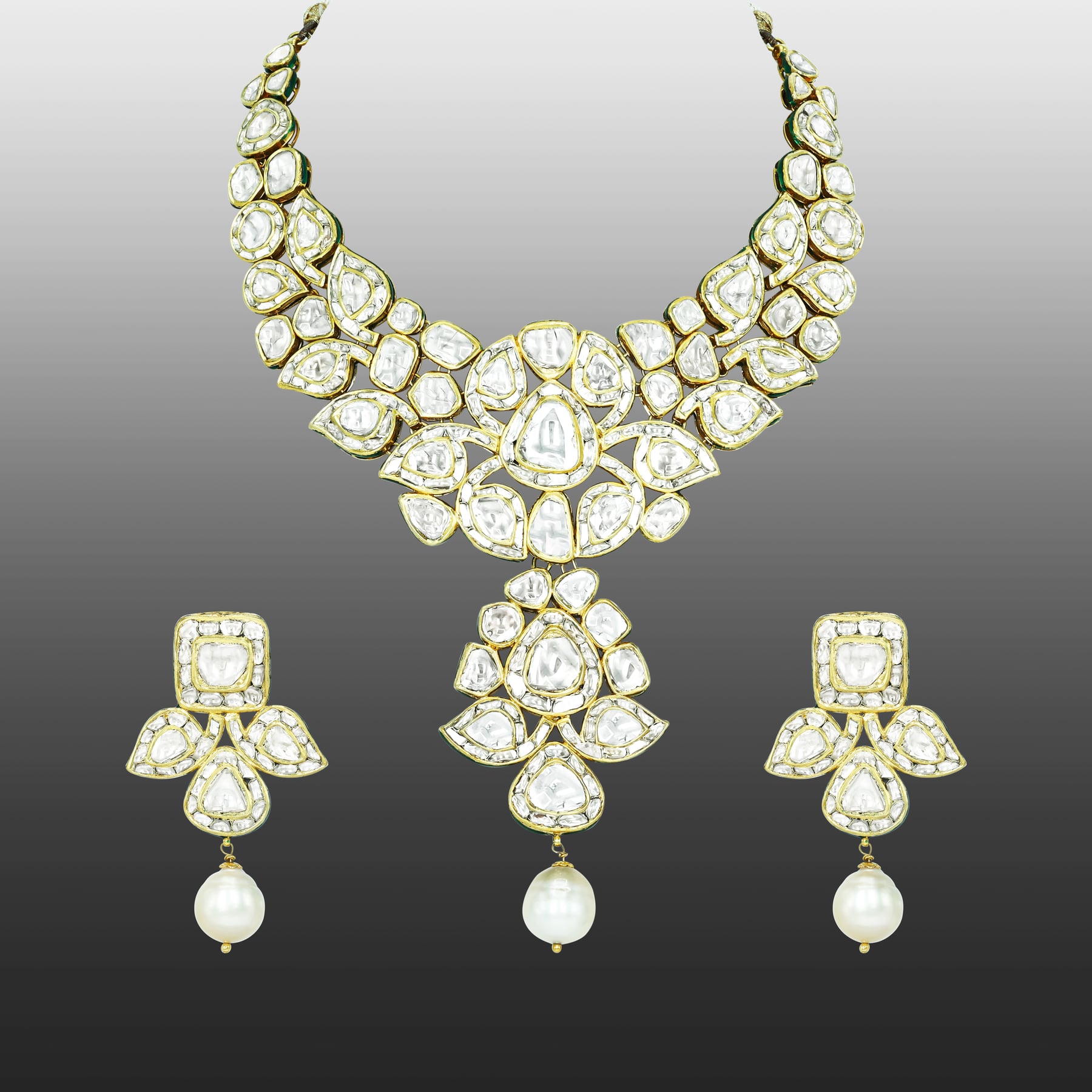 Asymmetrical Polki Necklace Set with Green Enamel and Pearl Drop