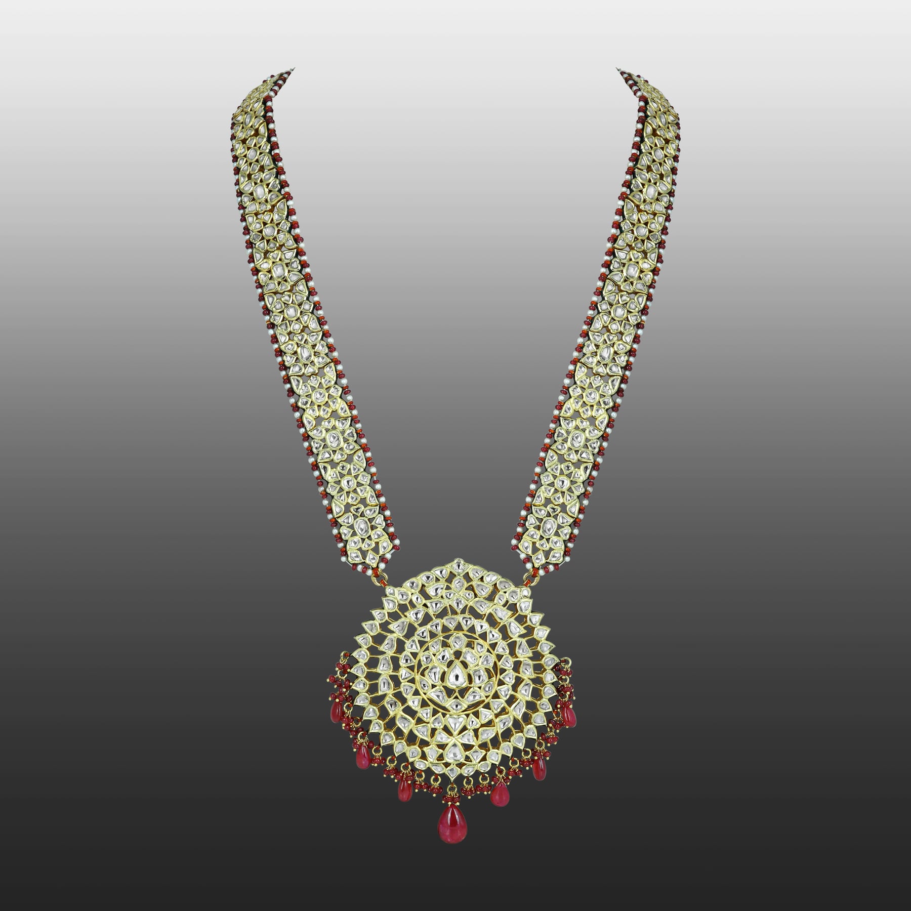 Polki Patri Haar Necklace with Spiral Pendant and Ruby Drops